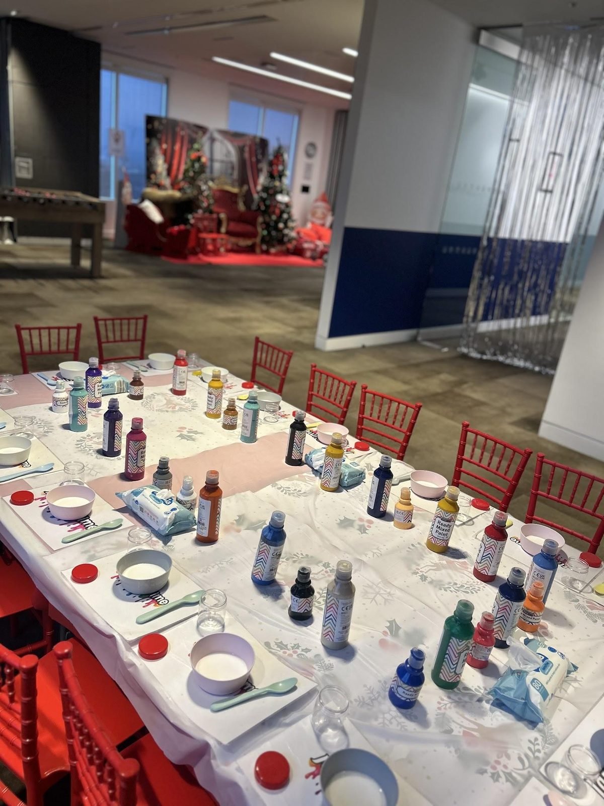 A Jazzy Slime table set up inside a real office for a workplace Christmas celebration